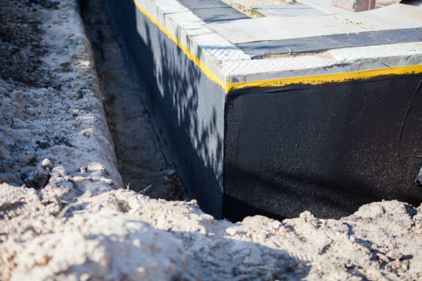 Professional Waterproofing technician working in Ray, OH